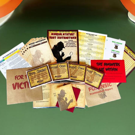 A vintage horror movie memorabilia set displayed on a green surface, featuring a collection of printed cards, tickets, and a small red booklet. The set is styled with retro orange and cream table lamps and a retro floral pillow in the background.