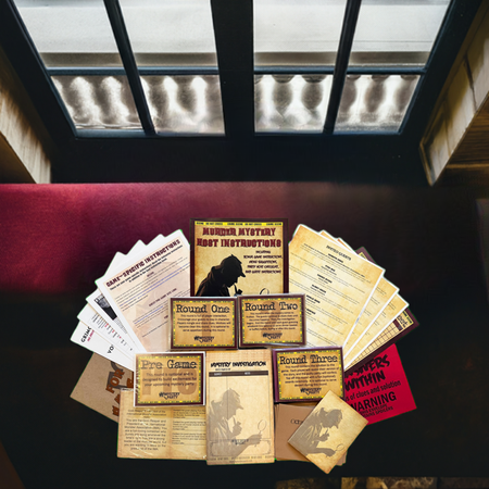 A tabletop display of a vintage-style mystery game set, including instruction cards, round cards, a red warning card, and a small map card, arranged on a dark wooden surface under a window.